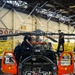 Coast Guard aircraft maintainers conduct maintenance on helicopter in Kodiak, Alaska