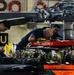 Coast Guard aircraft maintainers conduct maintenance on helicopter in Kodiak, Alaska