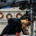Coast Guard aircraft maintainers conduct maintenance on helicopter in Kodiak, Alaska