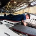 Coast Guard aircraft maintainers conduct maintenance on helicopter in Kodiak, Alaska