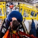 Coast Guard aircraft maintainers conduct maintenance on helicopter in Kodiak, Alaska