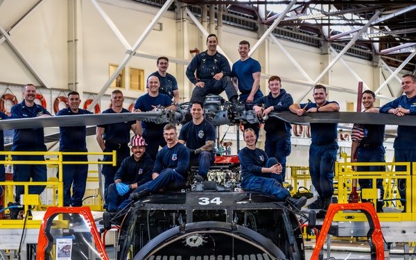 Coast Guard aircraft maintainers conduct maintenance on helicopter in Kodiak, Alaska