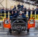 Coast Guard aircraft maintainers conduct maintenance on helicopter in Kodiak, Alaska
