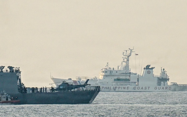 Midgett conducts passenger transfer during MCA