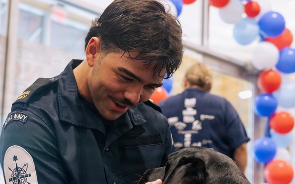 USO Hosts Dog and Paws Event at Julia Street Cruise Terminal during Sail 250