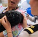 USO Hosts Dog and Paws Event at Julia Street Cruise Terminal during Sail 250