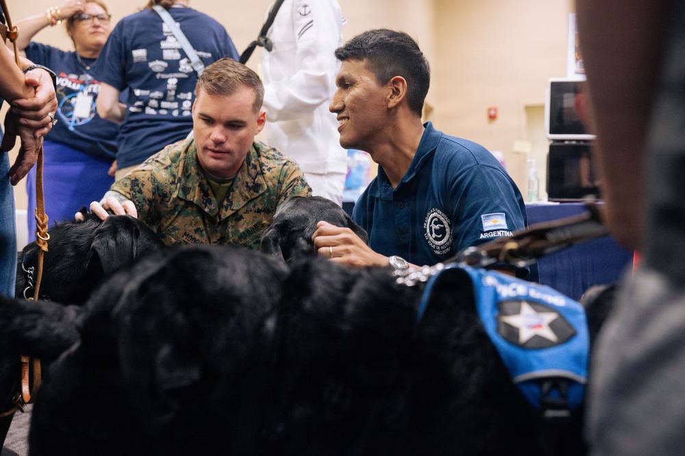 USO Hosts Dog and Paws Event at Julia Street Cruise Terminal during Sail 250