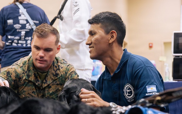 USO Hosts Dog and Paws Event at Julia Street Cruise Terminal during Sail 250