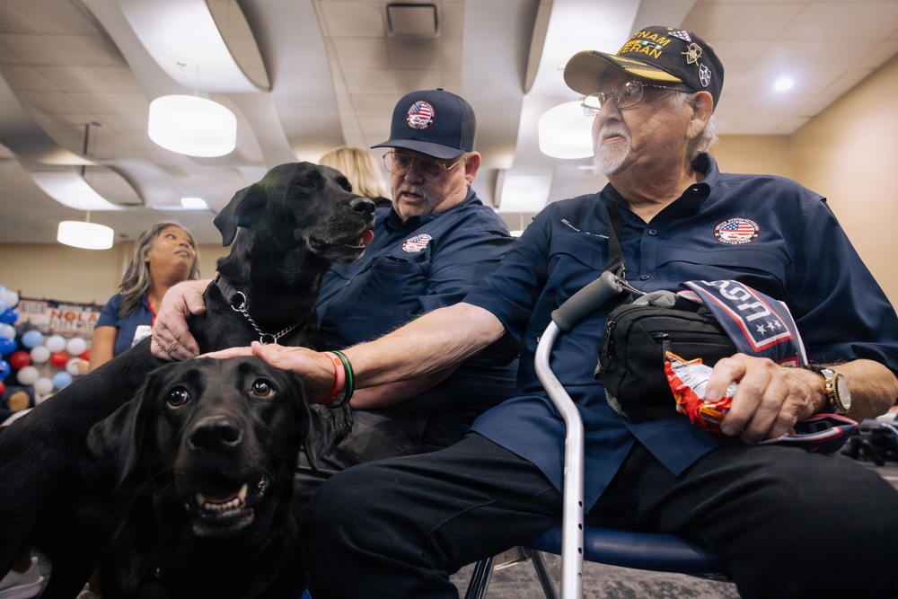 USO Hosts Dog and Paws Event at Julia Street Cruise Terminal during Sail 250
