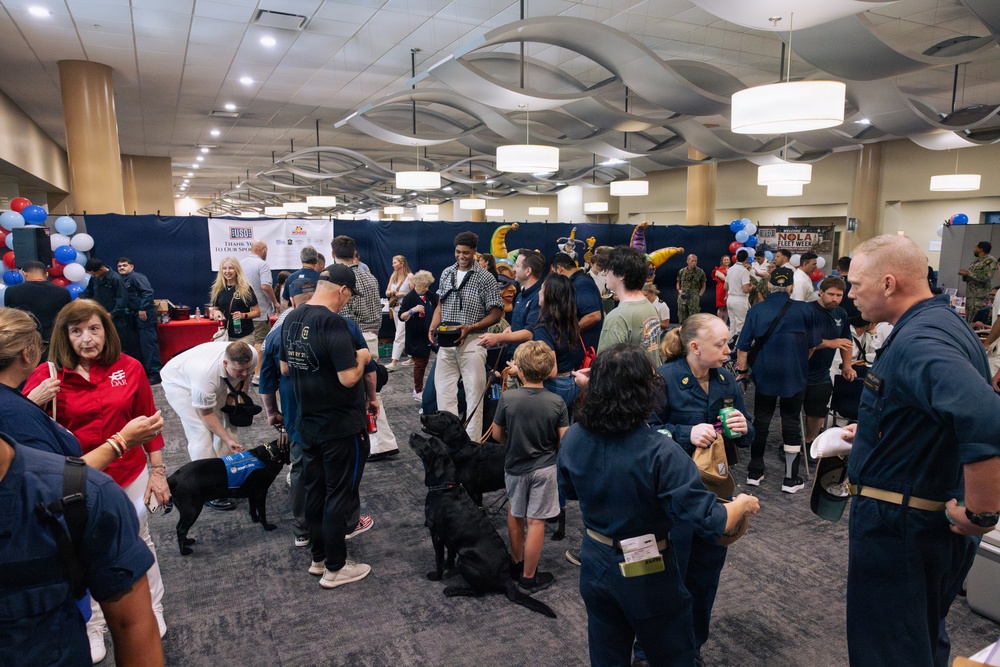 USO Hosts Dog and Paws Event at Julia Street Cruise Terminal during Sail 250