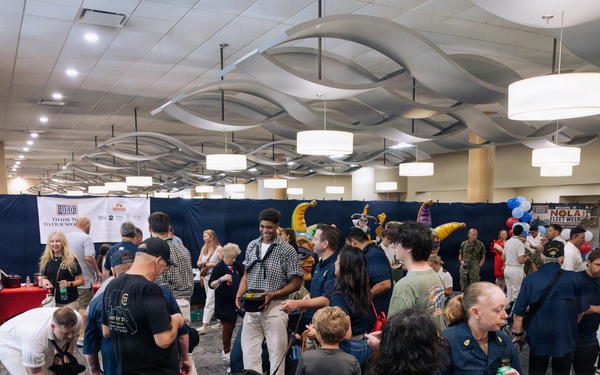 USO Hosts Dog and Paws Event at Julia Street Cruise Terminal during Sail 250