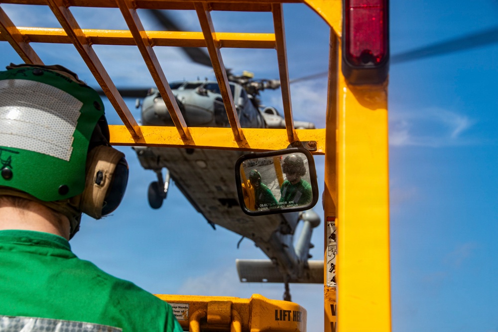 Nimitz Conducts a Vertical Replenishment at Sea