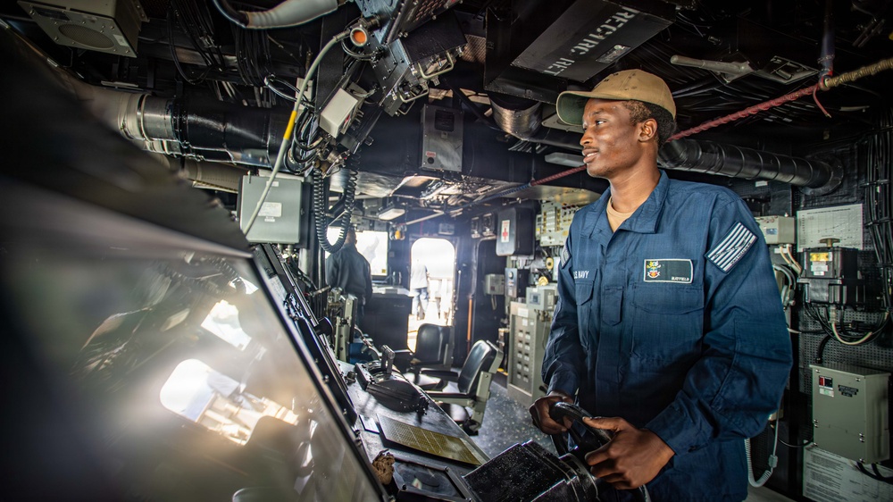 USS Gridley Sailor Steers Ship