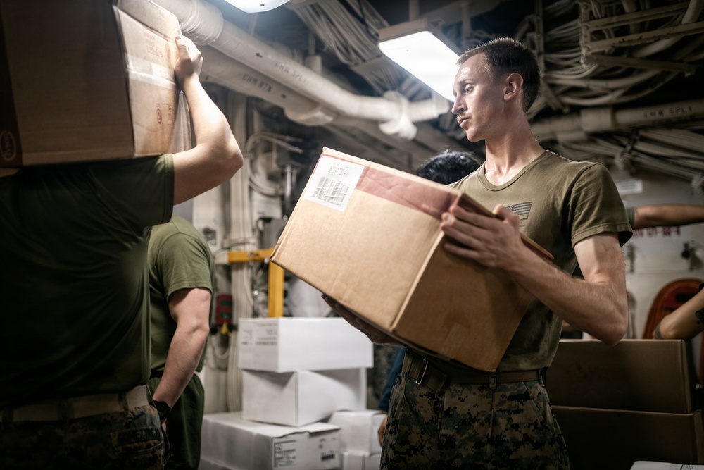 11th MEU Marines, Sailors Replenish Supplies aboard USS Portland