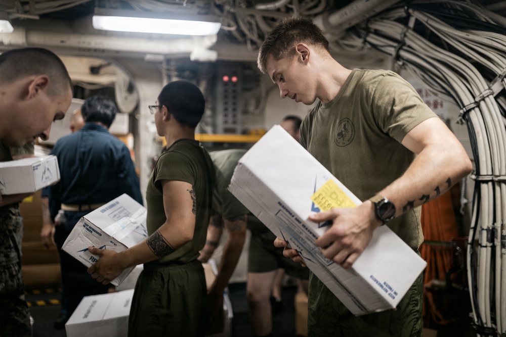11th MEU Marines, Sailors Replenish Supplies aboard USS Portland