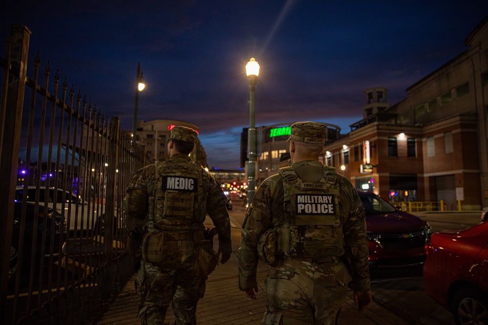 U.S. Army National Guard Military Police assigned to the Memphis Safe Task Force conduct a patrol of Beale Street
