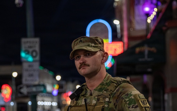 U.S. Army National Guard Military Police assigned to the Memphis Safe Task Force conduct a safety patrol of Beale Street