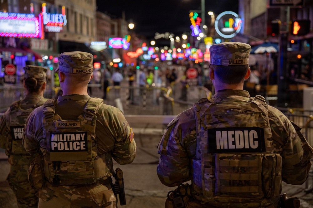 U.S. Army National Guard Military Police assigned to the Memphis Safe Task Force conduct a safety patrol of Beale Street