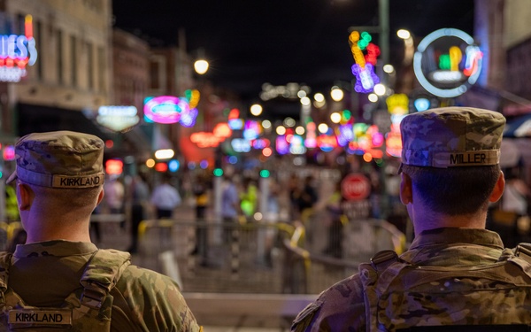 U.S. Army National Guard Military Police assigned to the Memphis Safe Task Force conduct a safety patrol of Beale Street