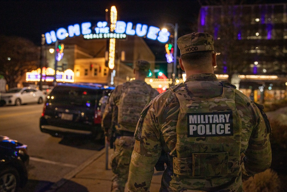 U.S. Army National Guard Military Police assigned to the Memphis Safe Task Force conduct a patrol of Beale Street