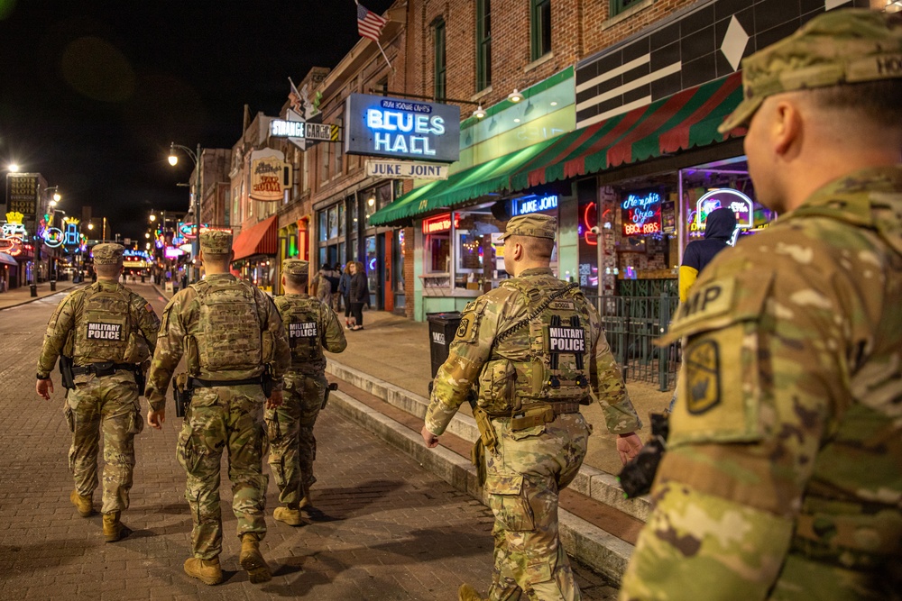 U.S. Army National Guard Military Police assigned to the Memphis Safe Task Force conduct a patrol of Beale Street