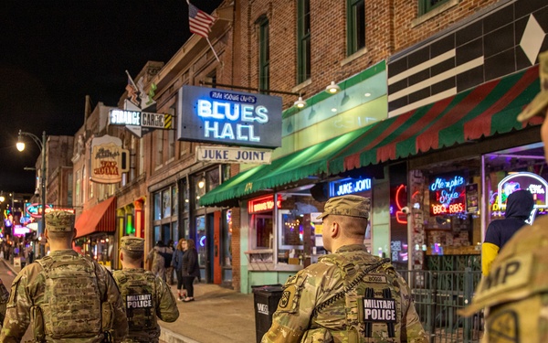 U.S. Army National Guard Military Police assigned to the Memphis Safe Task Force conduct a patrol of Beale Street