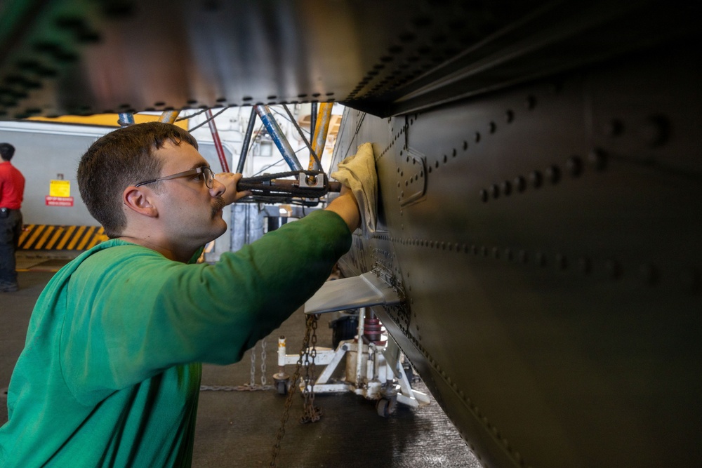 USS Iwo Jima Sailors Conduct Aircraft Maintenance