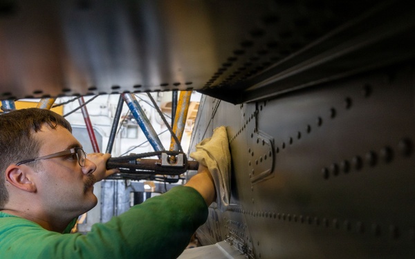USS Iwo Jima Sailors Conduct Aircraft Maintenance
