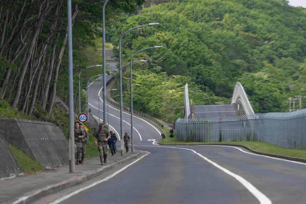 Team Misawa test readiness in Norwegian Foot March