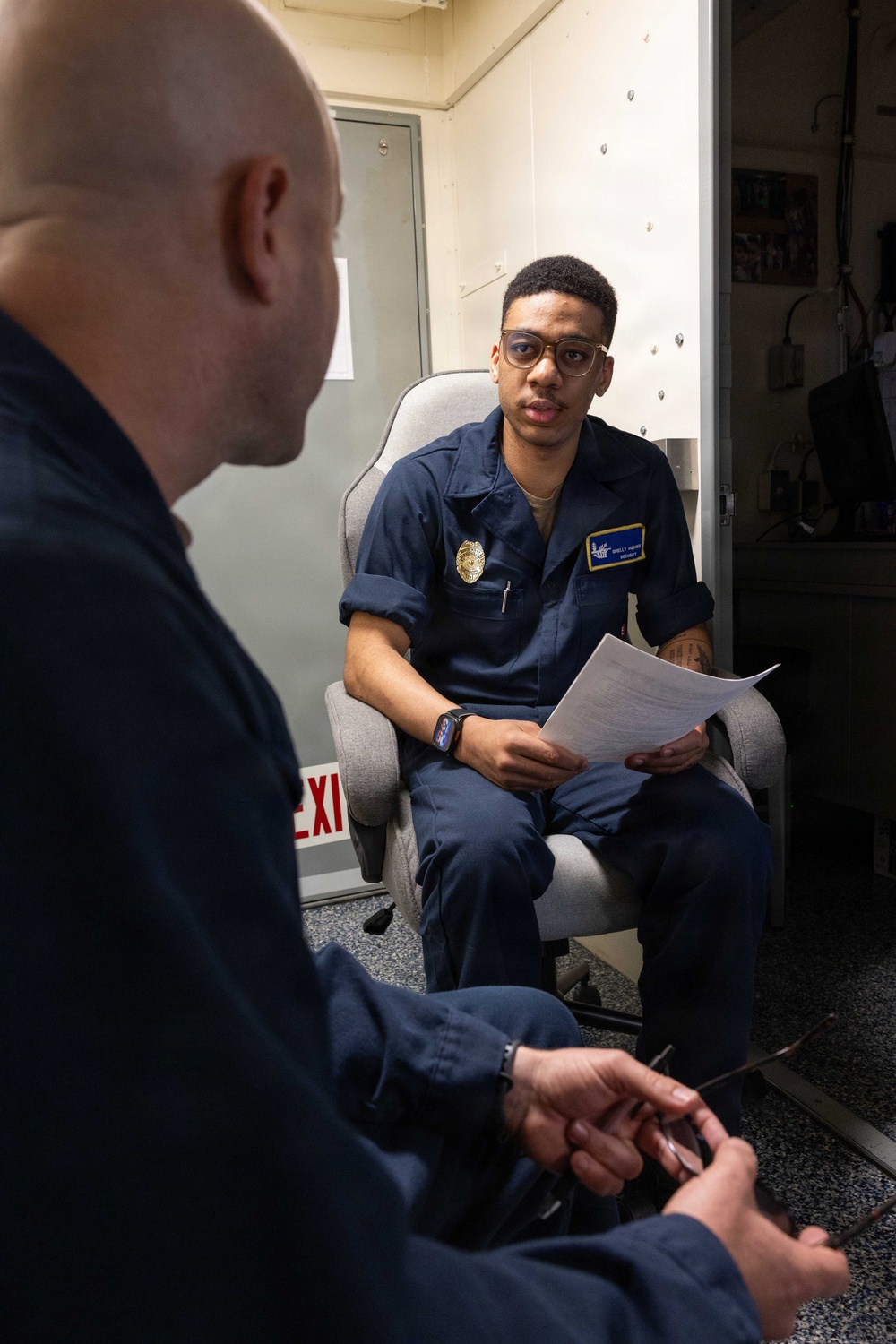John F. Kennedy Sailors Study For Qualification