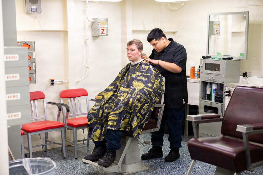 John F. Kennedy Sailor Cuts Hair