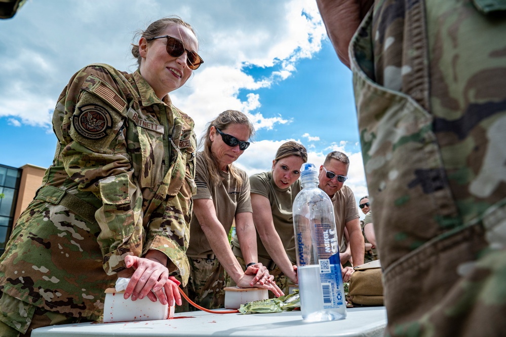 911th AES Airmen build lifesaving skills during TCCC course