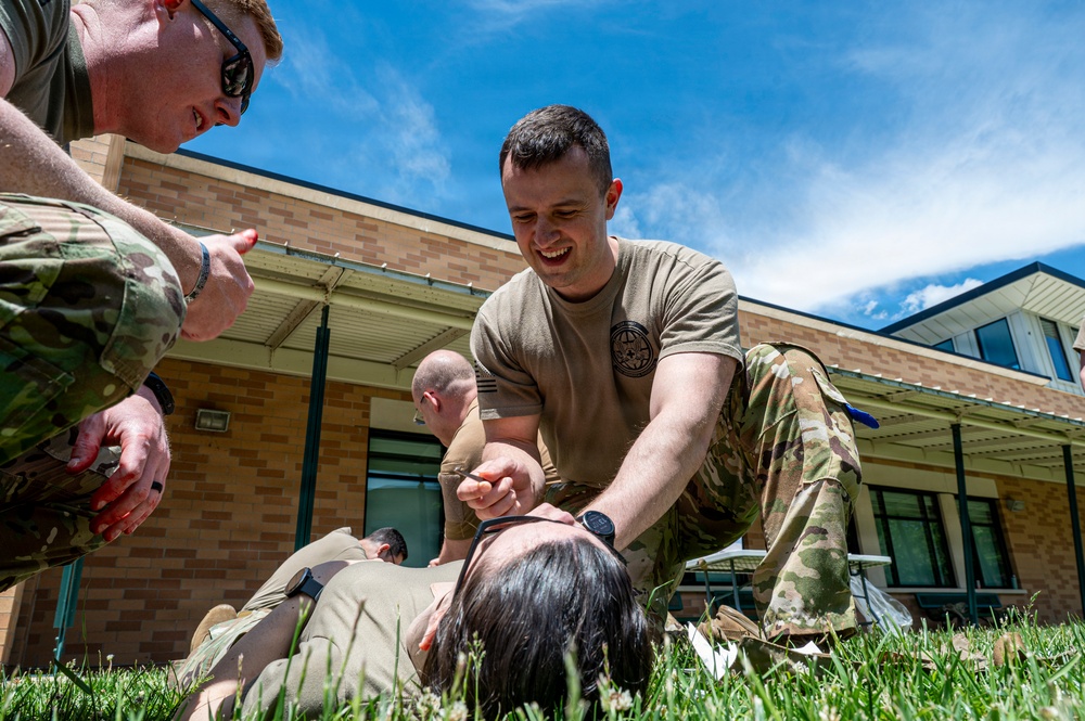 911th AES Airmen build lifesaving skills during TCCC course