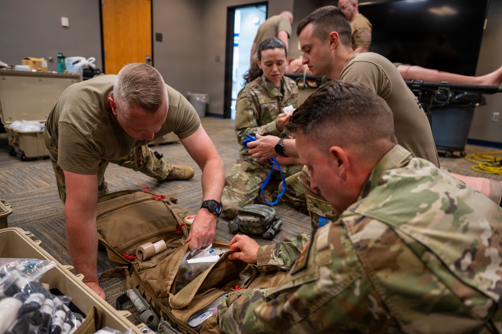 911th AES Airmen build lifesaving skills during TCCC course