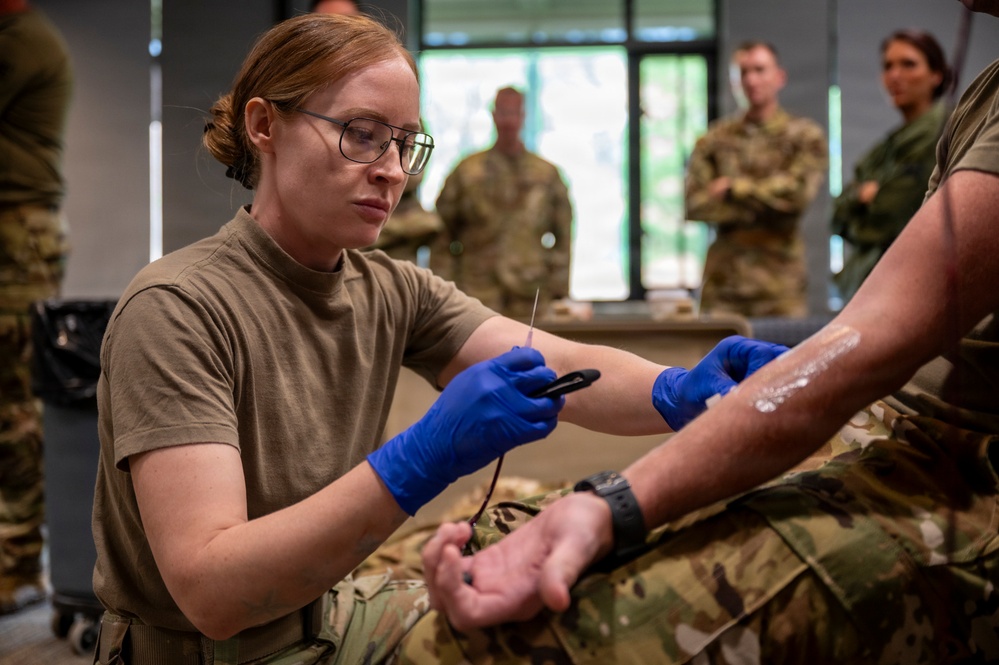 911th AES Airmen build lifesaving skills during TCCC course