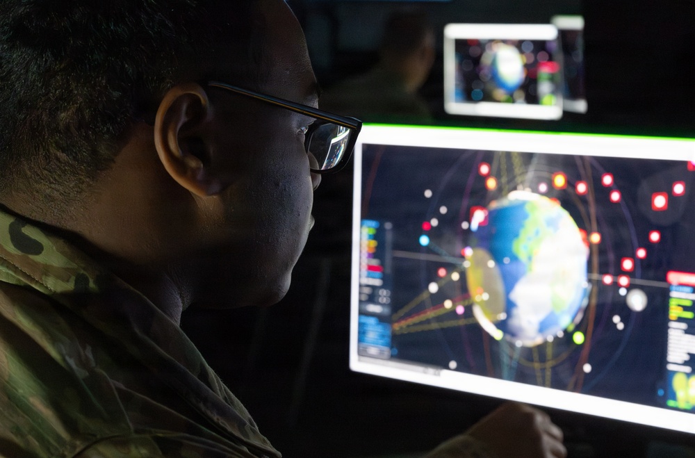 Combined Space Operations Center / Combat Delta 1-5 Operators Monitoring Space Effects Displays