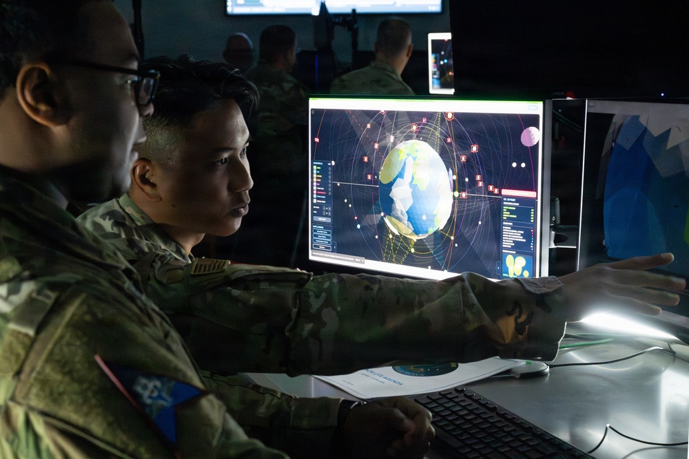 Combined Space Operations Center / Combat Delta 1-5 Operators Monitoring Space Effects Displays