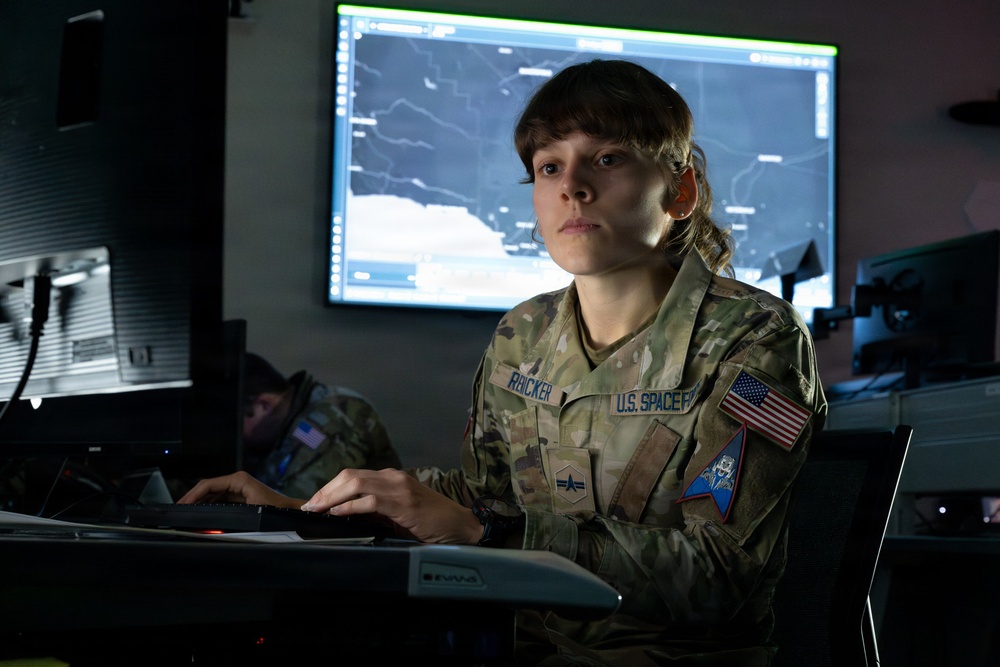 U.S. Space Force Specialist Guardian monitors operations at a command and control workstation