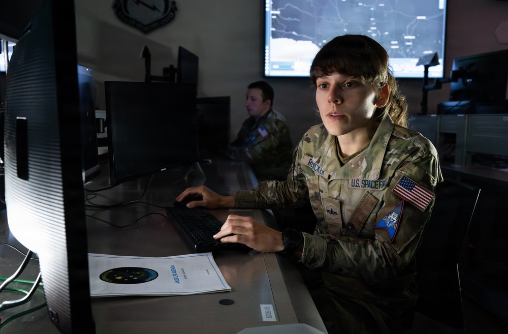 U.S. Space Force Guardian monitors operations at a command and control workstation