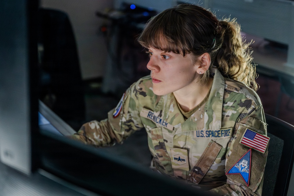 U.S. Space Force Guardian monitors computer workstation during operations