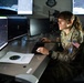 U.S. Space Force Guardian monitors space domain awareness systems at operations center
