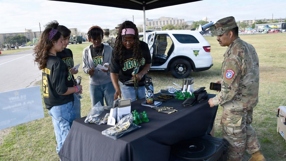 Army soldier engages students at the U.S. Army Experience