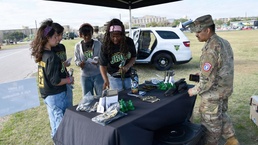 Army soldier engages students at the U.S. Army Experience