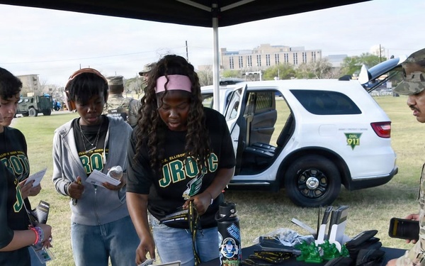 Army soldier engages students at the U.S. Army Experience
