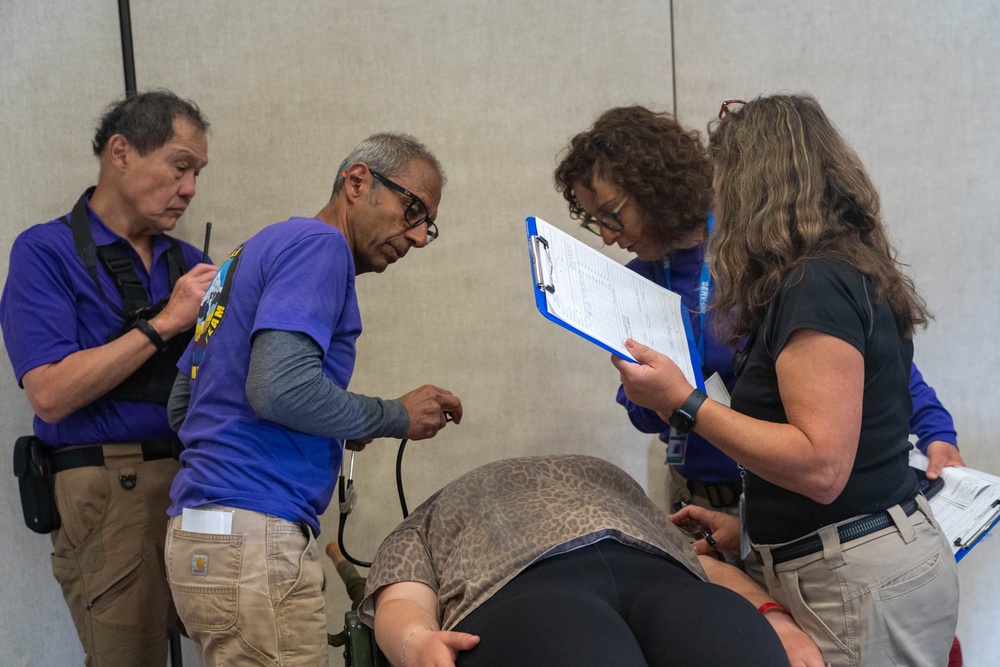 Disaster medical teams conduct patient assessments during Pathfinder 2026