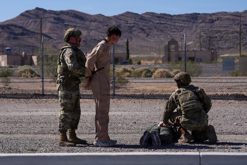 Combat readiness inspection integrates simulated threats; 432nd Wing Airmen respond
