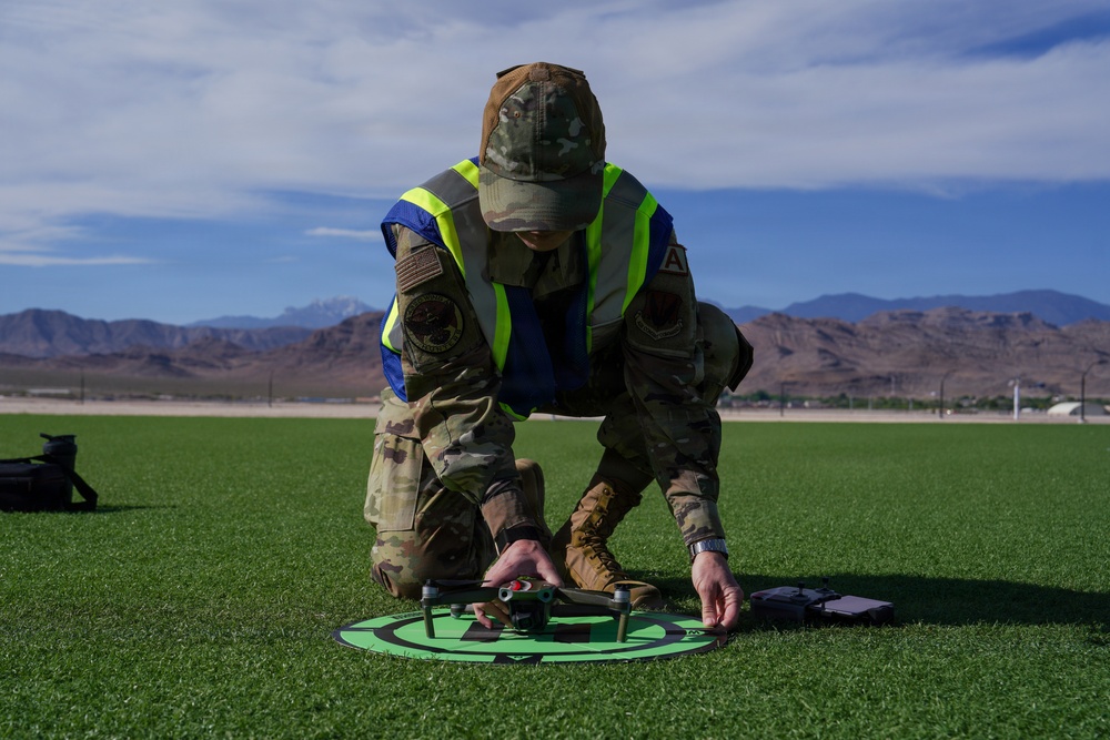Combat readiness inspection integrates simulated threats; 432nd Wing Airmen respond