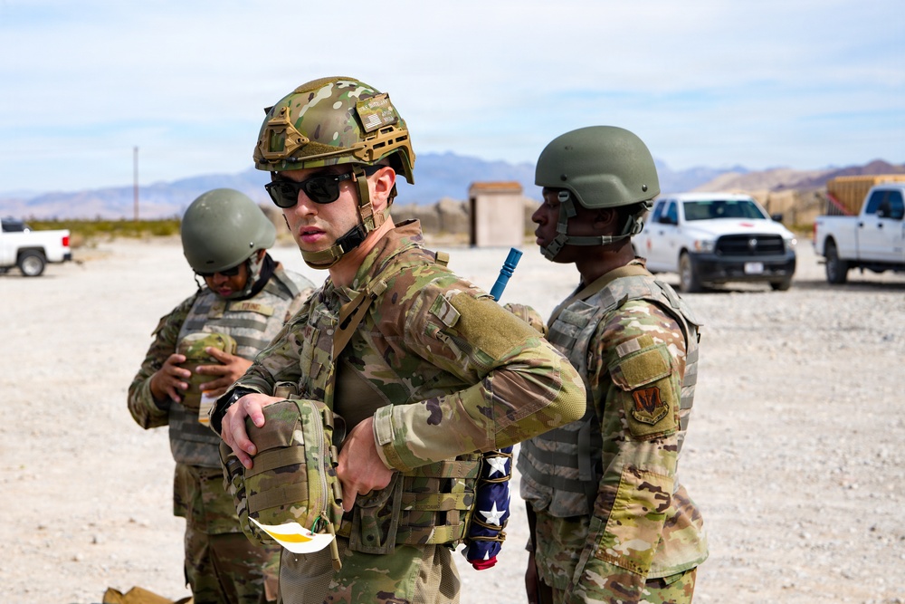 Combat readiness inspection integrates simulated threats; 432nd Wing Airmen respond