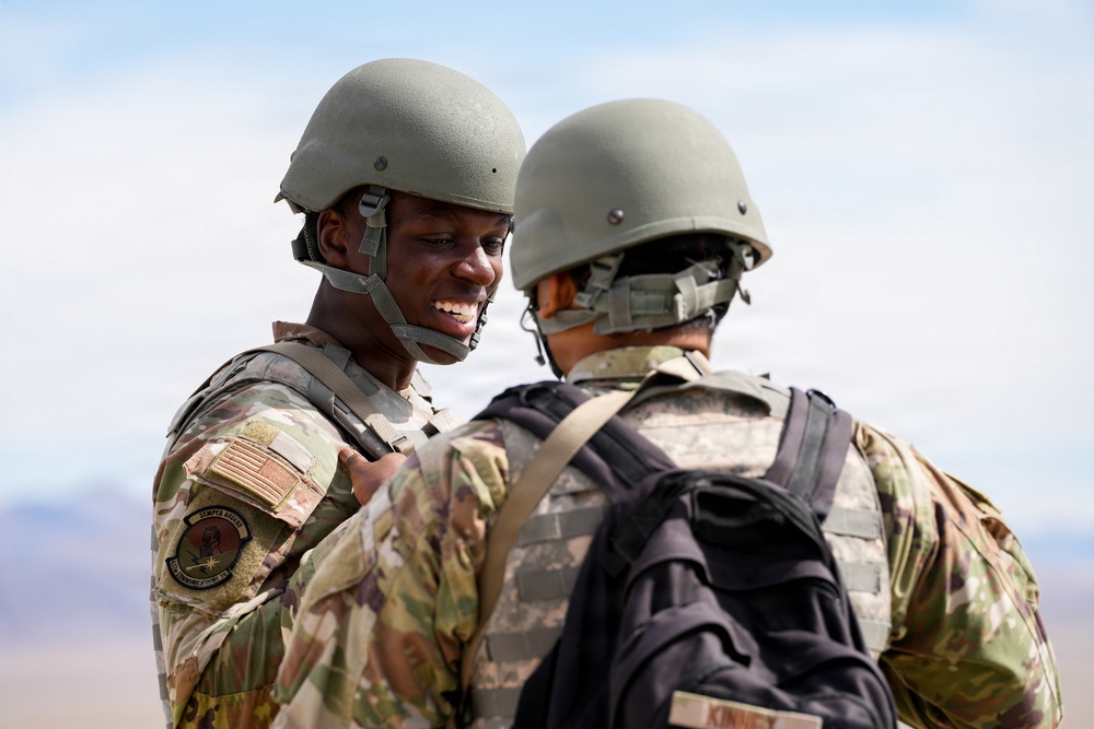 Combat readiness inspection integrates simulated threats; 432nd Wing Airmen respond