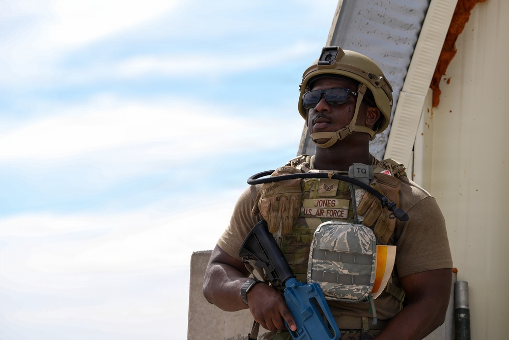 Combat readiness inspection integrates simulated threats; 432nd Wing Airmen respond